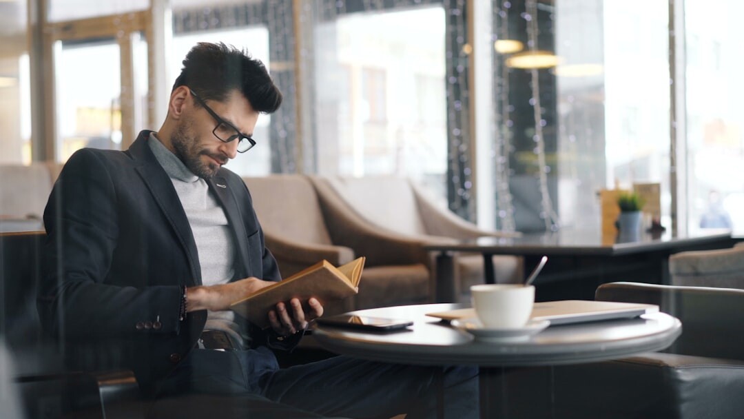 Professional checking networking event schedule on a tablet